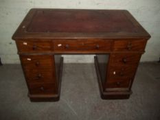 A TWIN PEDESTAL GEORGIAN LEATHER INLAID DESK OF SMALL PROPORTIONS