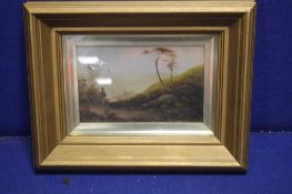 A FRAMED AND GLAZED WATERCOLOUR OF A COASTAL SCENE