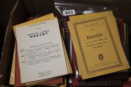 A BOX CONTAINING A QUANTITY OF HARD BACK BOOKS RELATING TO MUSIC, together with a collection of
