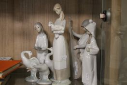 A COLLECTION OF 7 LLADRO FIGURINES