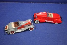 TWO DANBURY MINT CARS TO INCLUDE RED PACKARD AND A GREY DEUSENBURG