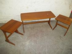 A RETRO TEAK DANISH NEST OF TABLES
