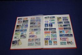 AN ALBUM OF SPACE RELATED STAMPS