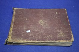 AN ALBUM OF PHOTOGRAPHS OF BUILDINGS, PEOPLE ETC