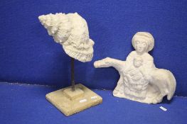 A RESIN TOGETHER WITH A SCULPTURE