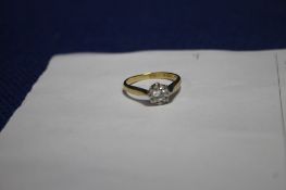 A DIAMOND SET YELLOW METAL RING SIZE L