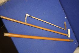 A VINTAGE BANDED WALKING STICK WITH INSCRIPTION DATED 1894, TOGETHER WITH A RIDING WHIP AND