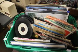 A TRAY OF ASSORTED RECORDS AND SINGLES (TRAY/S NOT INCLUDED)