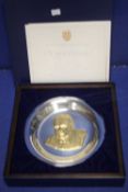A SIR WINSTON CHURCHILL STERLING SILVER PORTRAIT PLATE WITH GOLD OVERLAY BOXED WITH COA