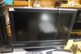 A PANASONIC 26 INCH FLAT SCREEN TV