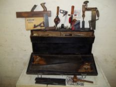 A VINTAGE CARPENTERS TOOL BOX AND CONTENTS