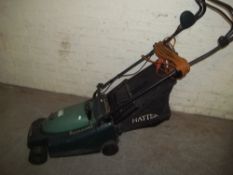 AN ELECTRIC LAWN MOWER