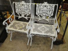 A PAIR OF VINTAGE LIGHT CAST GARDEN CHAIRS