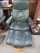 AN EKORNES STRESSLESS ARM CHAIR AND FOOTSTOOL