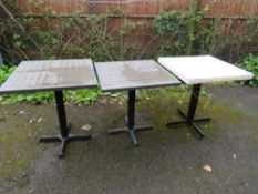 THREE MODERN PATIO TABLES