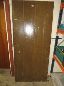 A LARGE VINTAGE WOODEN DOOR