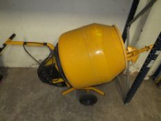 A YELLOW CEMENT MIXER