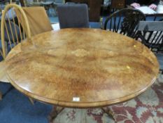 A VICTORIAN OVAL WALNUT TILT-TOP BREAKFAST TABLE