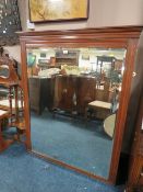 AN EDWARDIAN MAHOGANY OVERMANTLE MIRROR 140 X 116 CM