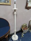 A CREAM PAINTED LAMP STANDARD