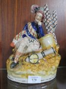 A 19TH CENTURY STAFFORDSHIRE FIGURE OF A SCOTSMAN