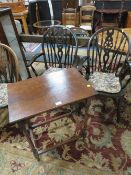 AN OAK SIDE TABLE TOGETHER WITH TWO WHEEL BACK CARVER CHAIRS (3)