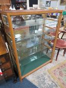 A MODERN HABERDASHERY STYLE GLASS DISPLAY CABINET H-127 CM W-93 CM