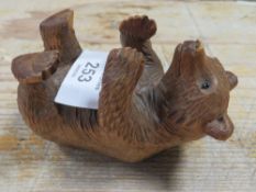 A BLACK FOREST CARVED FIGURE OF A BEAR
