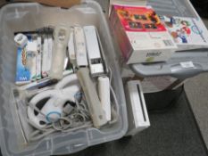 A NINTENDO Wii TOGETHER WITH GAMES AND ACCESSORIES - UNCHECKED