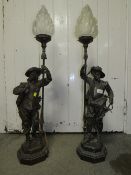 A PAIR OF SPELTER STYLE LAMPS IN THE FORM OF CAVALIERS
