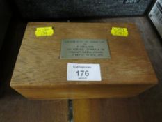 A SMALL WOODEN BOX 'PRESENTED BY THE ORIENT LINE TO E COULSON FOR SERVICES RENDERED ON ORSOVAS