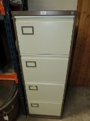 A FOUR DRAWER METAL FILING CABINET