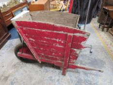 A LARGE VINTAGE WOODEN DEEP WHEEL BARROW A/F