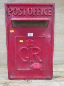 A VINTAGE FIBREGLASS TV PROP OF A POST OFFICE FRONTAGE FOR A WALL POST BOX