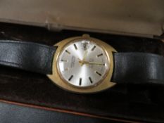 A VINTAGE BOXED MONTINE OF SWITZERLAND AUTOMATIC 25 JEWELS INCABLOC DATE WRISTWATCH IN ORIGINAL BOX
