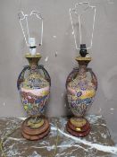 A PAIR OF 20TH CENTURY ORIENTAL STYLE TABLE LAMPS ON STANDS