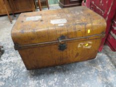 A VINTAGE TIN TRUNK