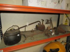 A SHELF FULL OF AGRICULTURAL BYGONES TO INCLUDE COOKING POT ETC