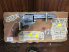 A WALL MOUNTED NOVELTY WYATT EARP REPLICA REVOLVER DISPLAY