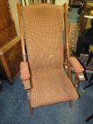 AN EARLY 20TH CENTURY MAHOGANY FOLDING CAMPAIGN CHAIR A/F