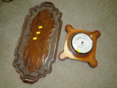 A JAMES LUCKING & CO LTD BAROMETER TOGETHER WITH A CARVED TWIN HANDLED WOODEN TRAY (2)