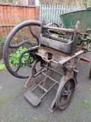 A LARGE CAST TREADLE PRESS