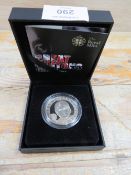 A COMMEMORATIVE 2010 £5 COIN FROM ALDERNEY WITH JOHN LENNON OF THE BEATLES TO THE REVERSE