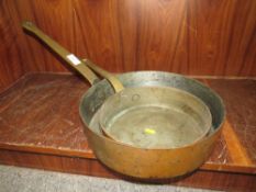 TWO HEAVY COPPER AND BRASS COOKING PANS