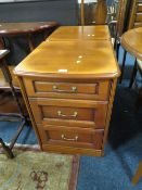 A PAIR OF MODERN THREE DRAWER BEDSIDE CHESTS