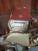 A VINTAGE LEATHER CASED GRUNDIG McMARETTTE RADIO WITH SPEAKER