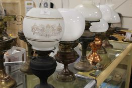 SIX ASSORTED VINTAGE OIL LAMPS