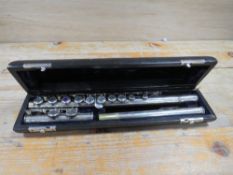 A CASED BUFFET CRAMPON FLUTE MARKED 'E'