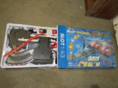 A SUPER VS SLOT RACING 1:43 SCALE RACING GAME - CONTENTS UNCHECKED