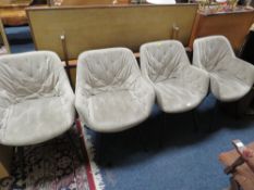 A SET OF FOUR MODERN UPHOLSTERED CHAIRS